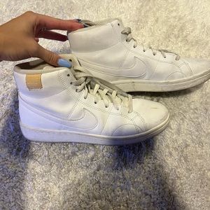 All white Nike blazers